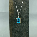 14ky/w Blue Topaz and Diamond Pendant